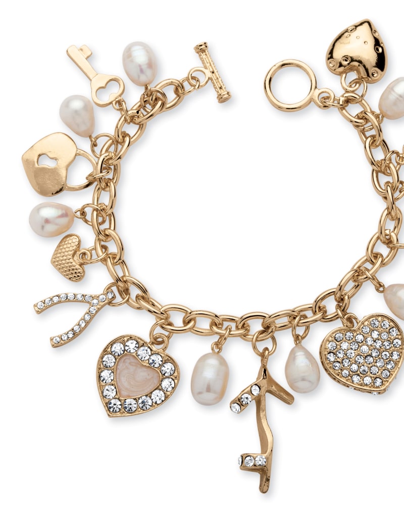 Front of a size 8 in Fashion Cultured Freshwater Pearl Crystal Charm Bracelet in Yellow Goldtone in White by PalmBeach Jewelry. | dia_product_style_image_id:333129